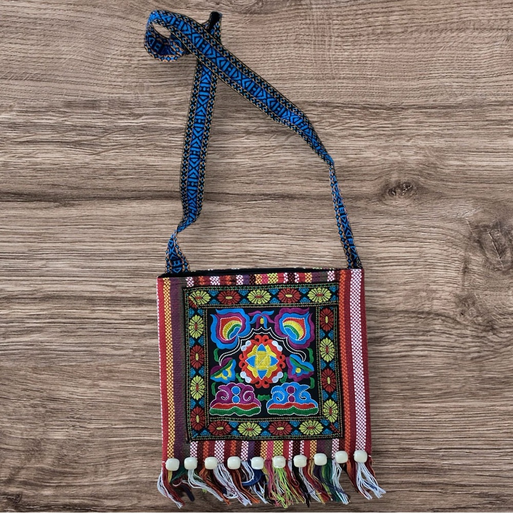 Red and Blue Crossbody Bag with Intricate Embroidery